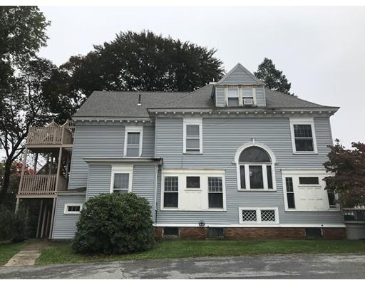 20 Marble Street Worcester, MA 01603 - Photo 5 of 30 a front view of a house with a yard
