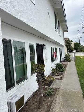 a view of house with patio outdoor seating and entertaining space