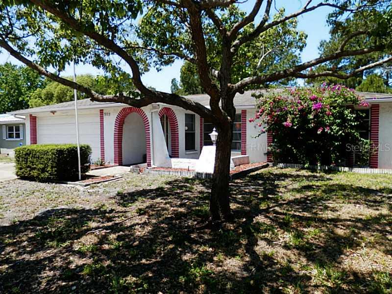 9115 Rainbow Lane Port Richey, FL 34668 - Photo 1 of 1 Exterior Front