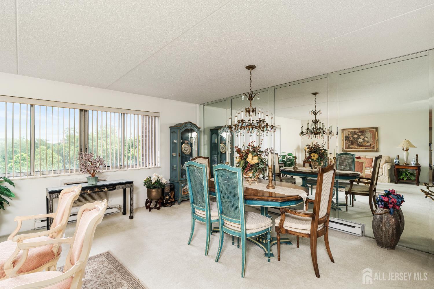 860 Lower Ferry Road, Unit 6D Ewing, NJ 08628 - Photo 13 of 40 a view of a dining room with furniture window and outside view