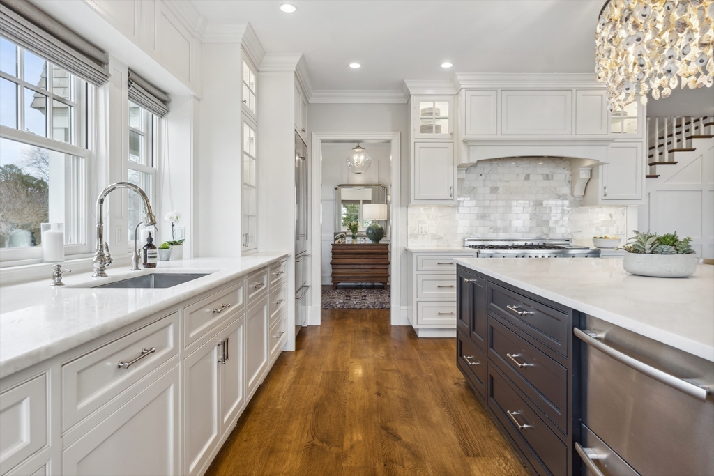 24 Greystone Road Marblehead, MA 01945 - Photo 11 of 42 a large kitchen with stainless steel appliances lots of counter space and a sink
