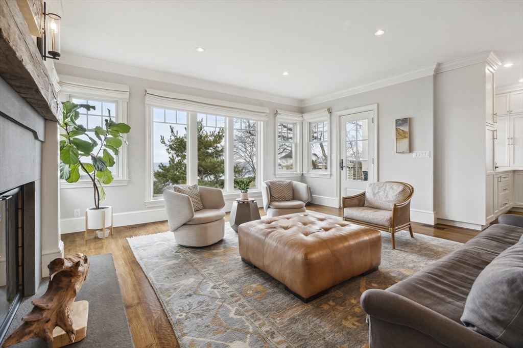 24 Greystone Road Marblehead, MA 01945 - Photo 16 of 42 a living room with furniture and a potted plant