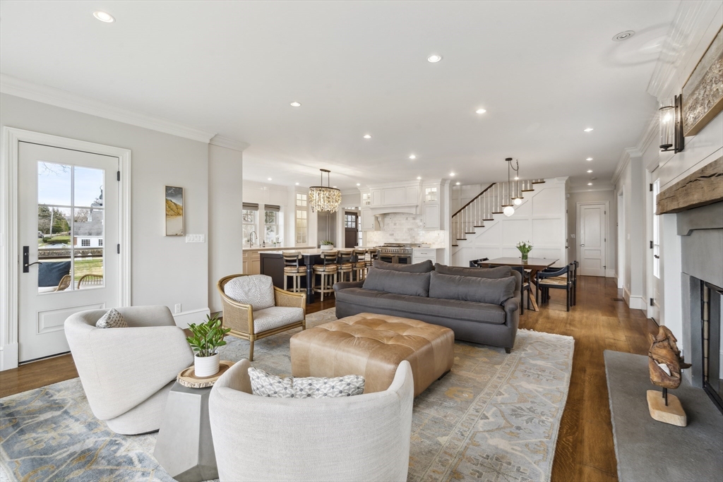 24 Greystone Road Marblehead, MA 01945 - Photo 17 of 42 a living room with fireplace furniture and a view of kitchen