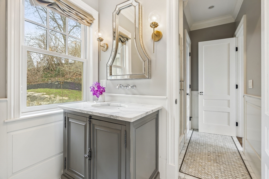 24 Greystone Road Marblehead, MA 01945 - Photo 23 of 42 a bathroom with a granite countertop shower and a sink