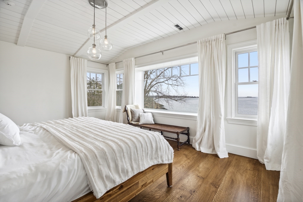24 Greystone Road Marblehead, MA 01945 - Photo 26 of 42 a bedroom with a large bed and a window