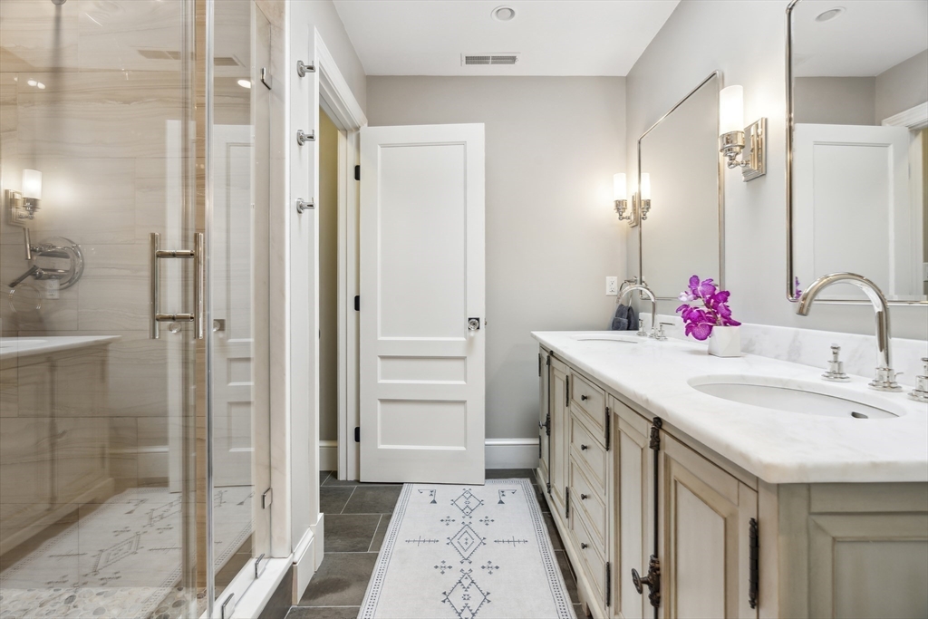 24 Greystone Road Marblehead, MA 01945 - Photo 29 of 42 a bathroom with a sink and a mirror