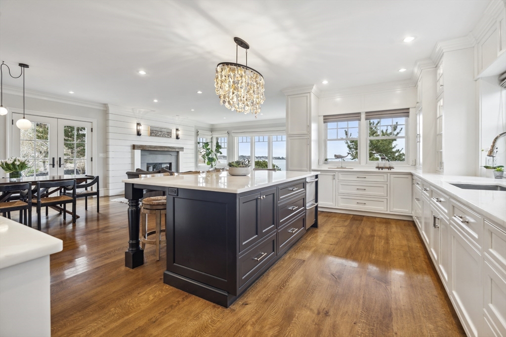 24 Greystone Road Marblehead, MA 01945 - Photo 8 of 42 a kitchen with stainless steel appliances sink and cabinets
