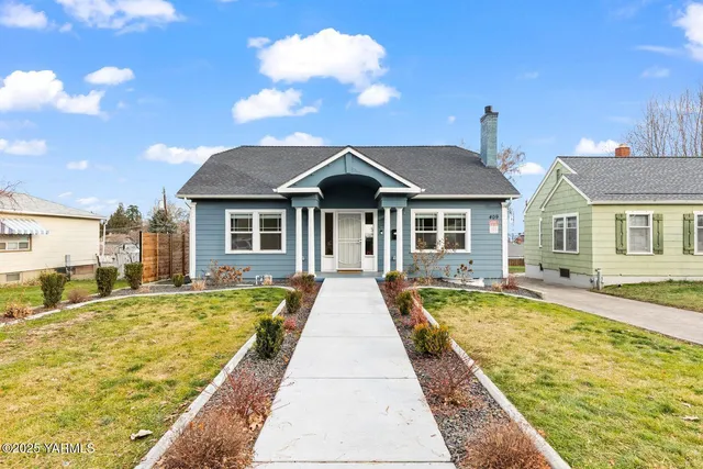 a front view of a house with swimming pool