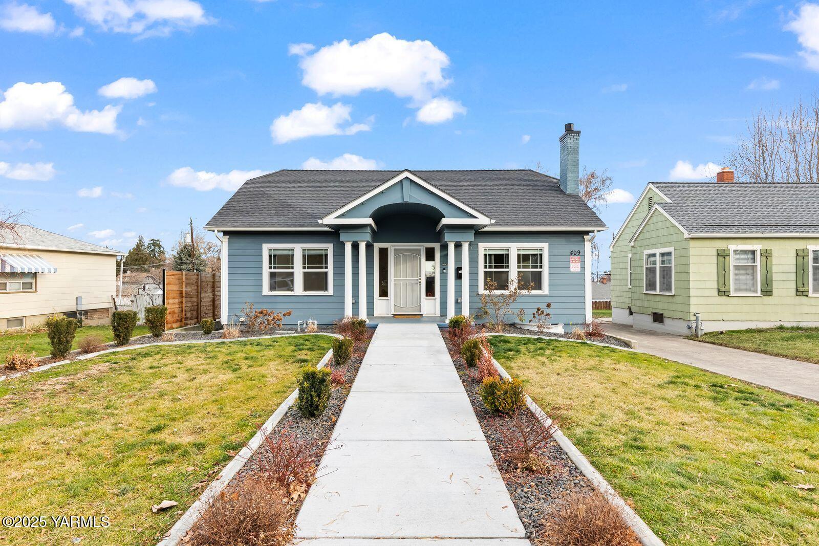 a front view of a house with swimming pool