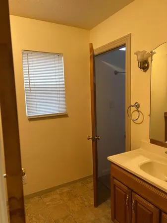 a bathroom with a sink and a bathtub