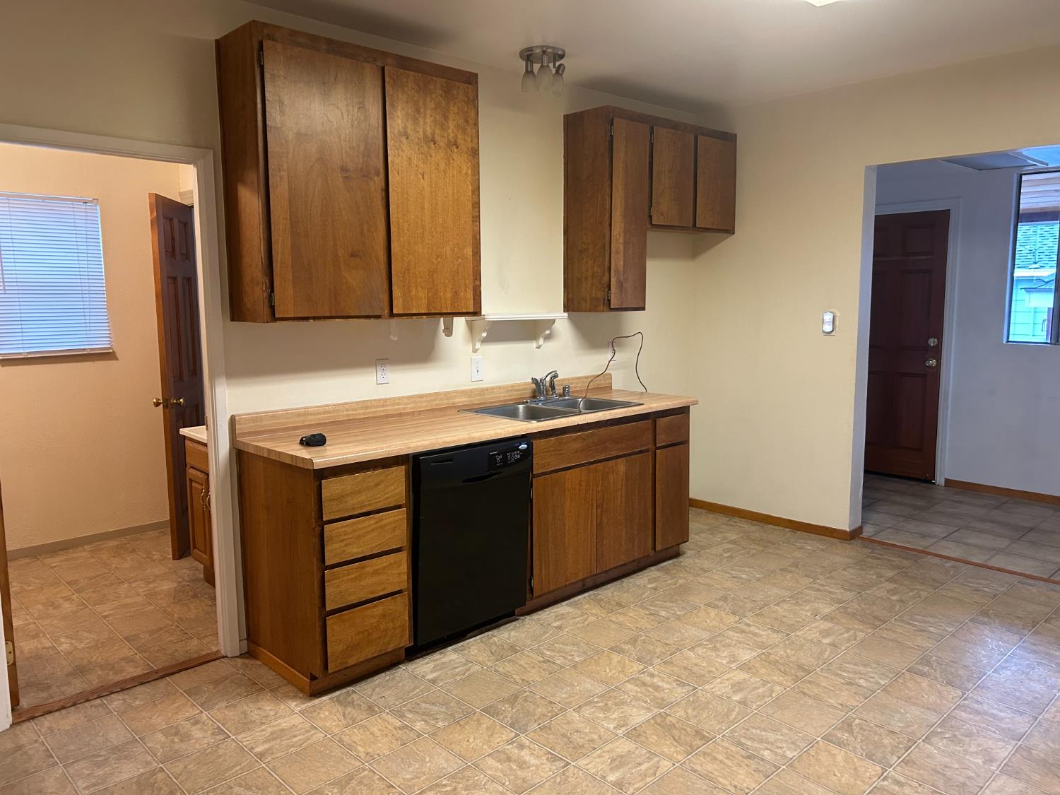 115 South Ione Street Ione, CA 95640 - Photo 4 of 15 a kitchen with stainless steel appliances granite countertop a sink stove and refrigerator