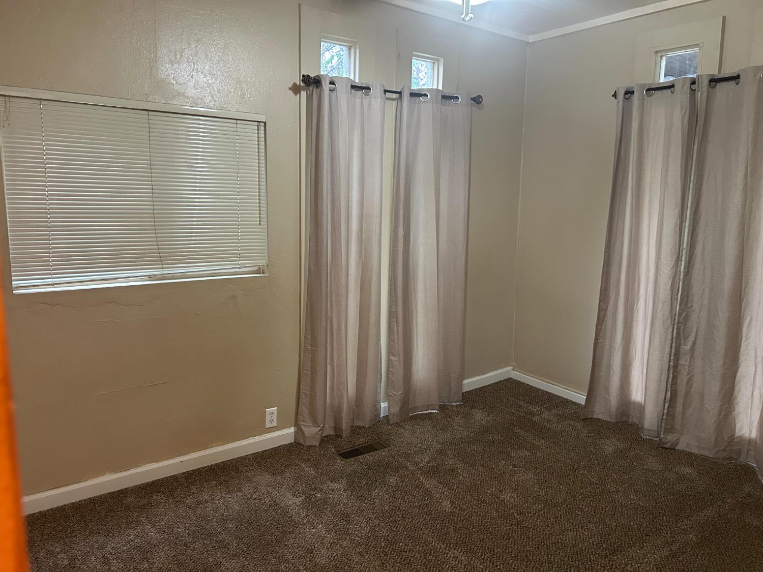 115 South Ione Street Ione, CA 95640 - Photo 7 of 15 an empty room with windows