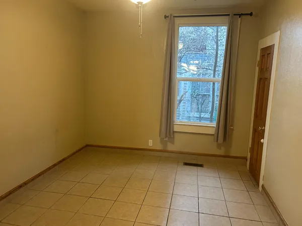 a view of an empty room with window