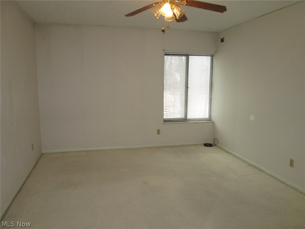 22958 Maple Ridge Road, Unit 208 North Olmsted, OH 44070 - Photo 12 of 35 Main bedroom(12 x 15) with ceiling fan, its own full bathroom and ample closets.