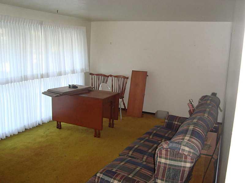 429 Spring Valley Road West Mifflin, PA 15122 - Photo 2 of 5 Living Room. Enjoy watching the view out the large window in the living room.
