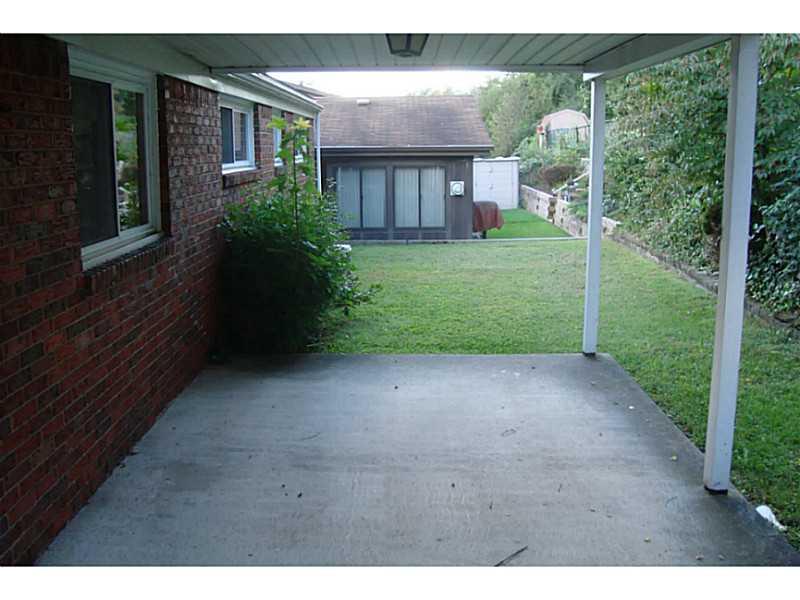 429 Spring Valley Road West Mifflin, PA 15122 - Photo 4 of 5 Patio/Deck. Peaceful, covered porch.