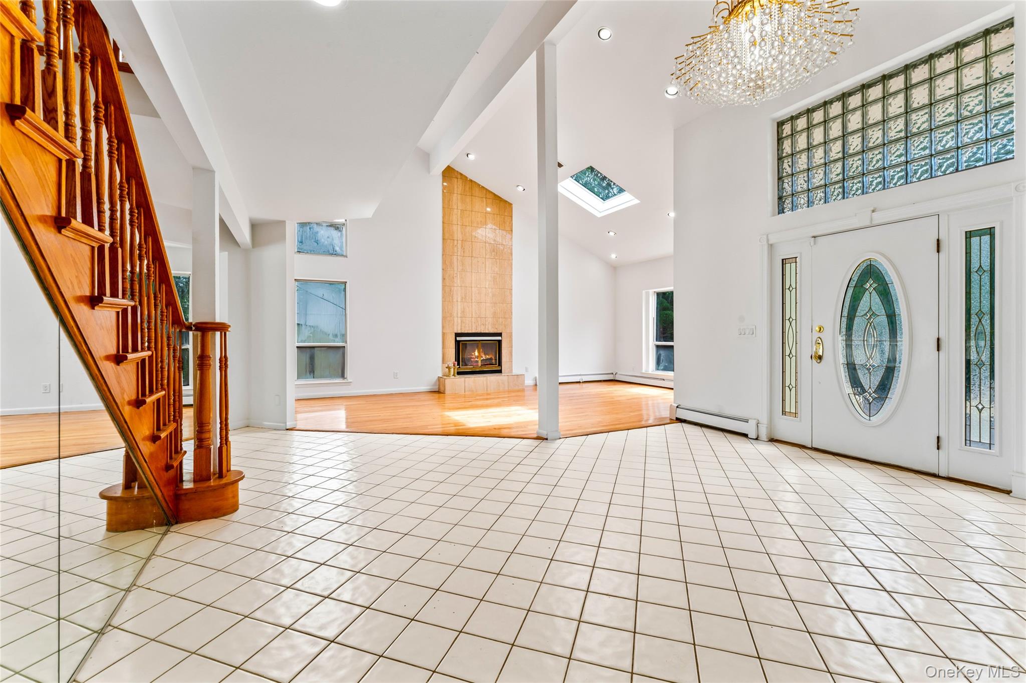 126 Bagatelle Road Melville, NY 11747 - Photo 9 of 50 a view of an entryway with wooden floor