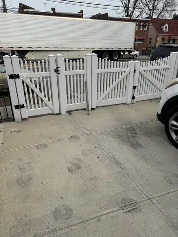 a view of a house with a small yard