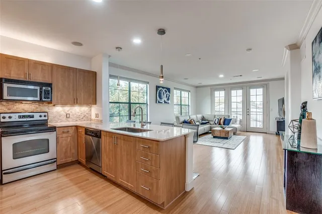 a view of a kitchen and dining room