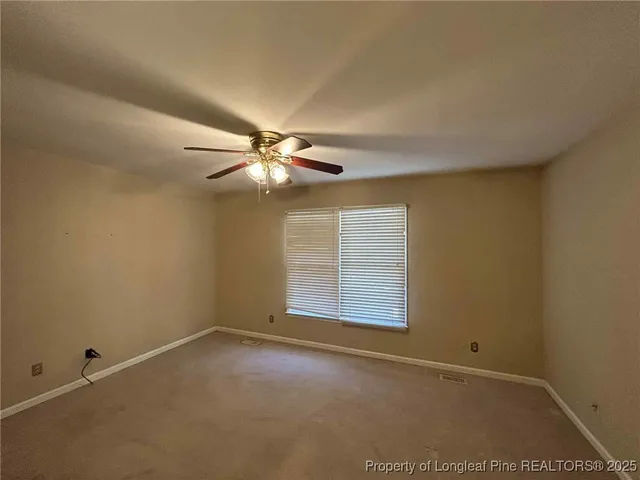 a bathroom with a sink toilet and mirror