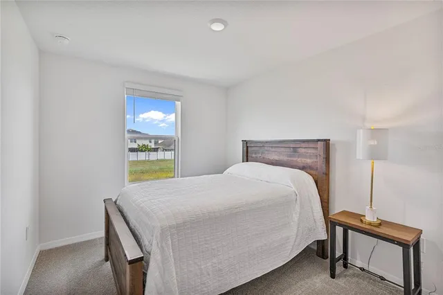 a view of a workspace with furniture