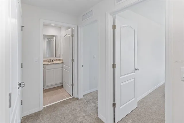 an outdoor space with furniture and garden view