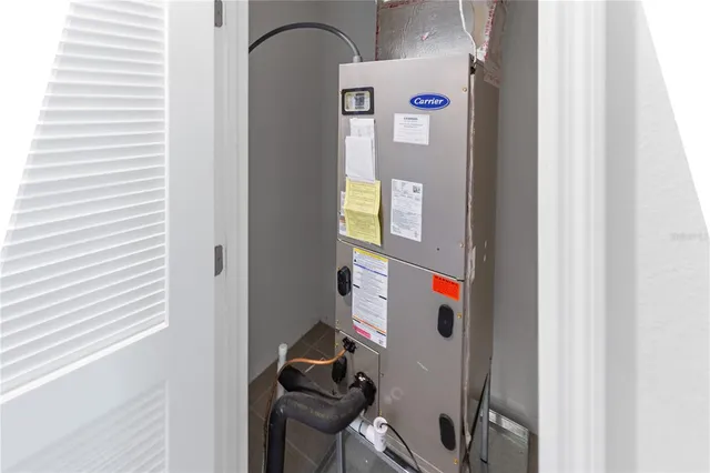 an aerial view of a house with a swimming pool outdoor seating and outdoor seating
