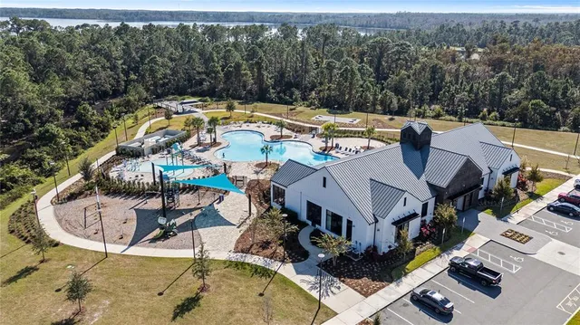 a view of a swimming pool with a garden