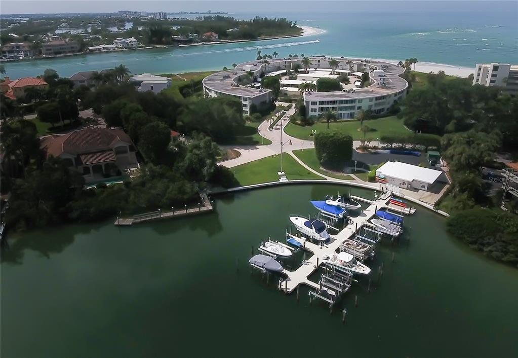 100 Sands Point Road, Unit 225 Longboat Key, FL 34228 - Photo 21 of 41 an aerial view of a house with outdoor space lake view and lake view