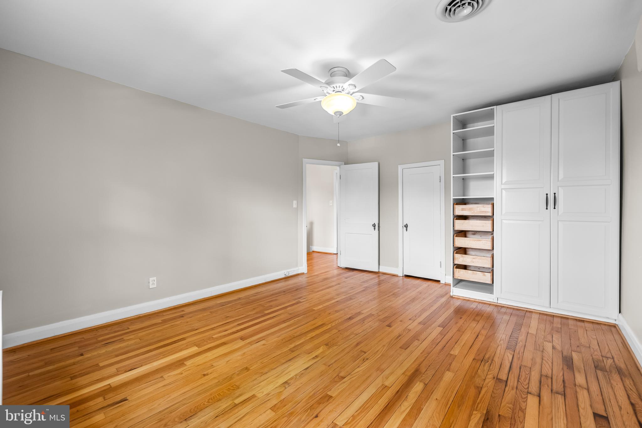 6449 Blenheim Road Baltimore, MD 21212 - Photo 24 of 36 wooden floor in an empty room