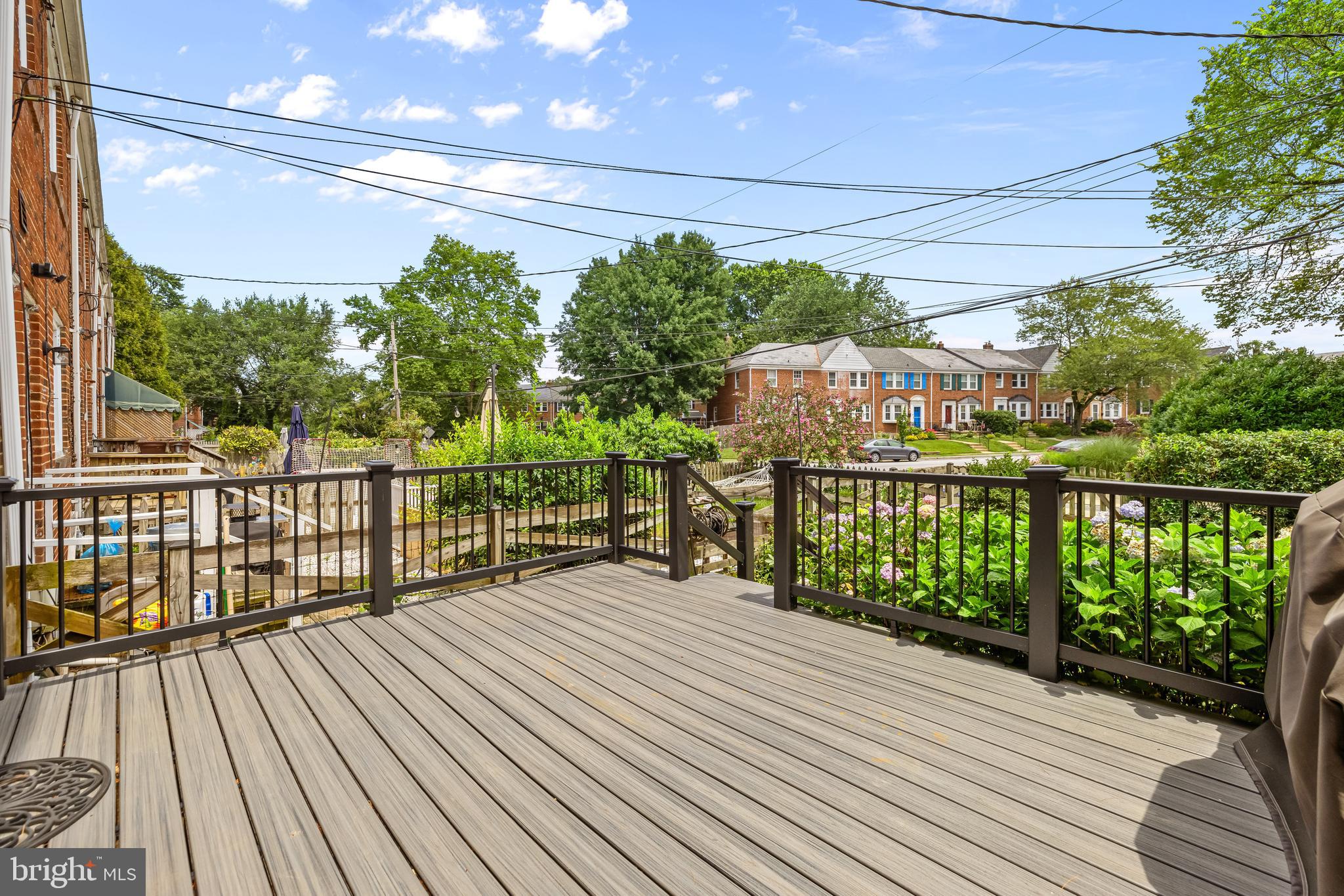 6449 Blenheim Road Baltimore, MD 21212 - Photo 31 of 36 a view of a balcony with wooden floor