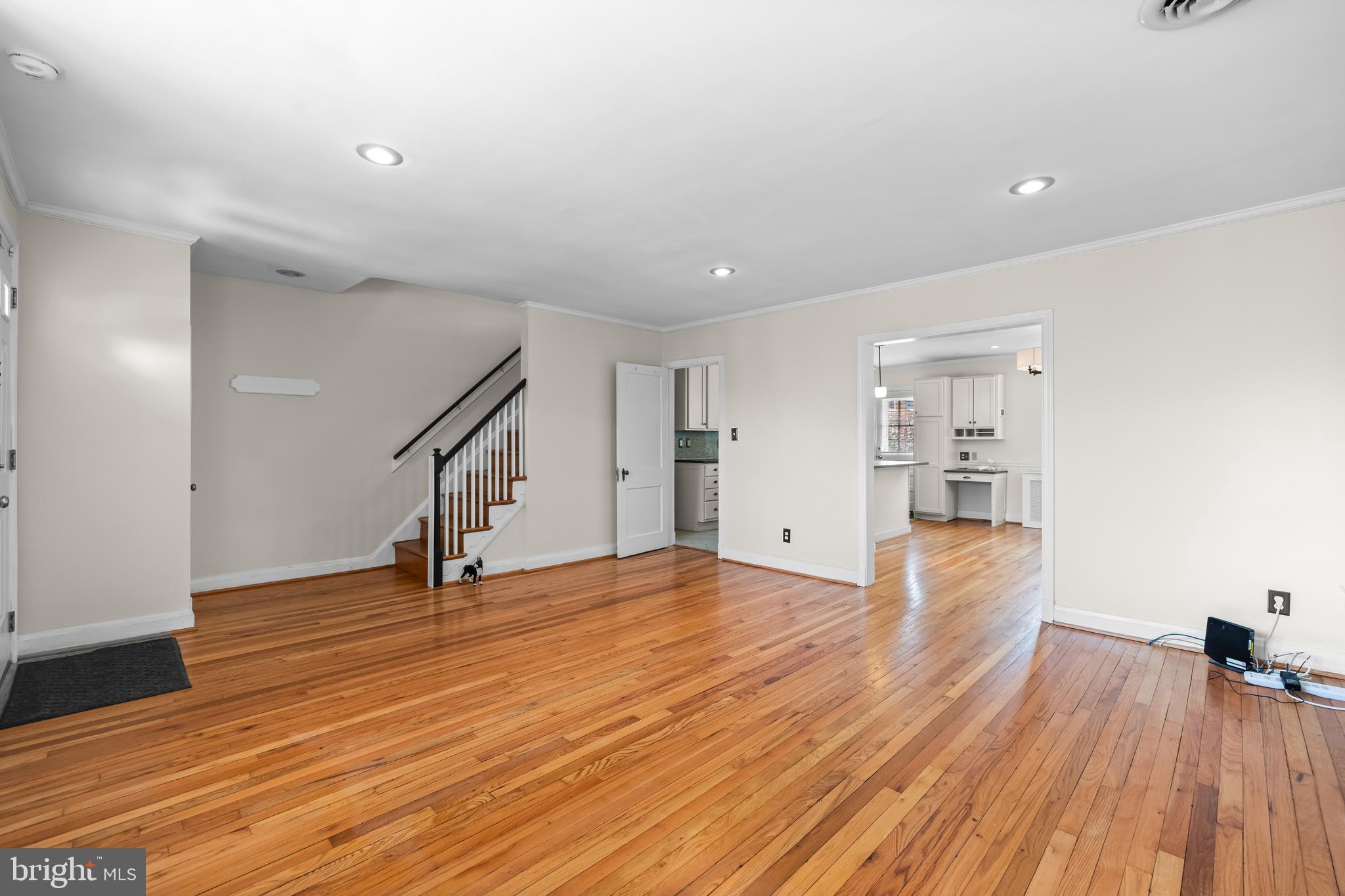 6449 Blenheim Road Baltimore, MD 21212 - Photo 6 of 36 a view of empty room with wooden floor