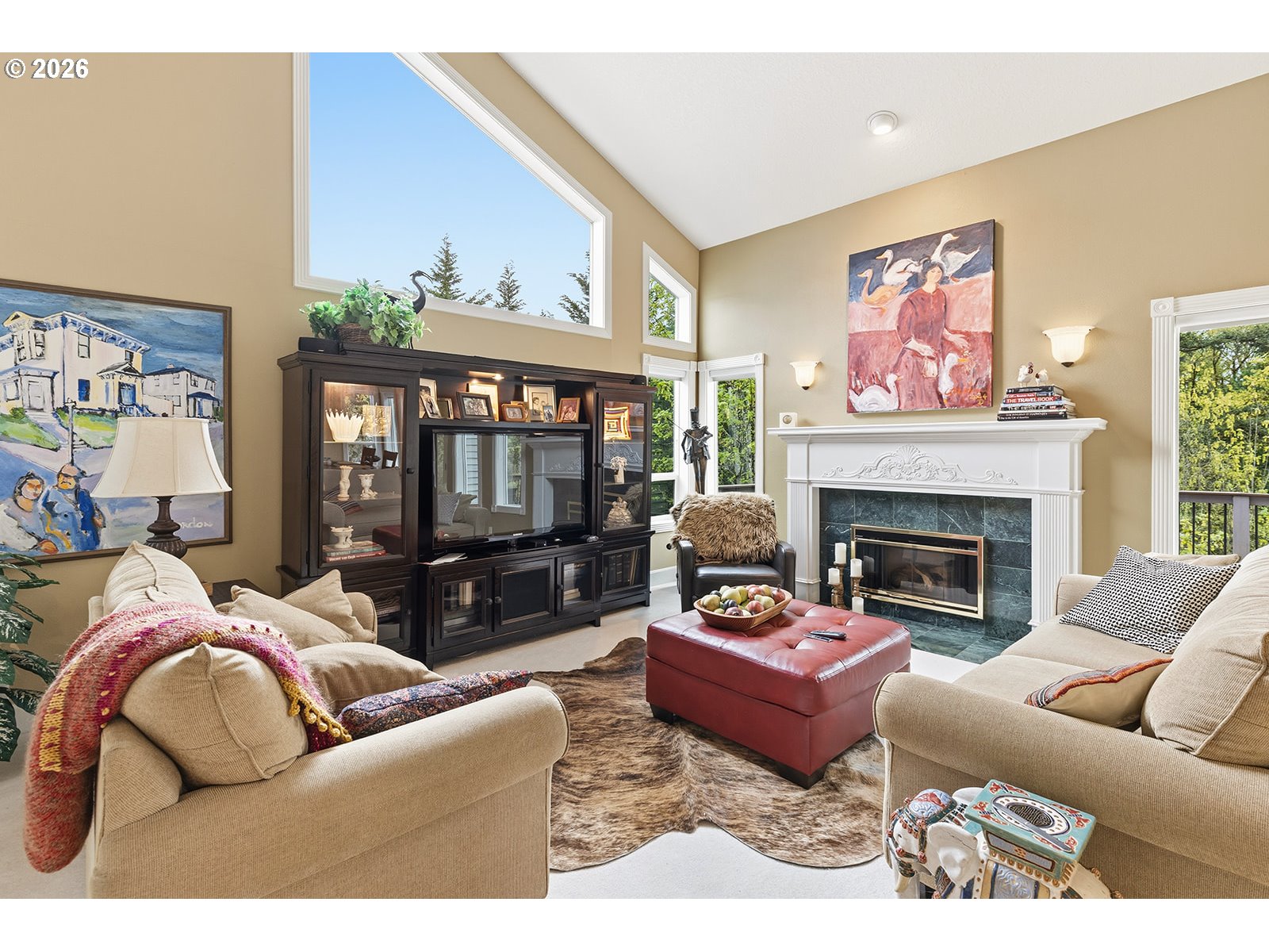 15917 Northeast Union Road, Unit 16 Ridgefield, WA 98642 - Photo 20 of 47 a living room with furniture a fireplace and a large window