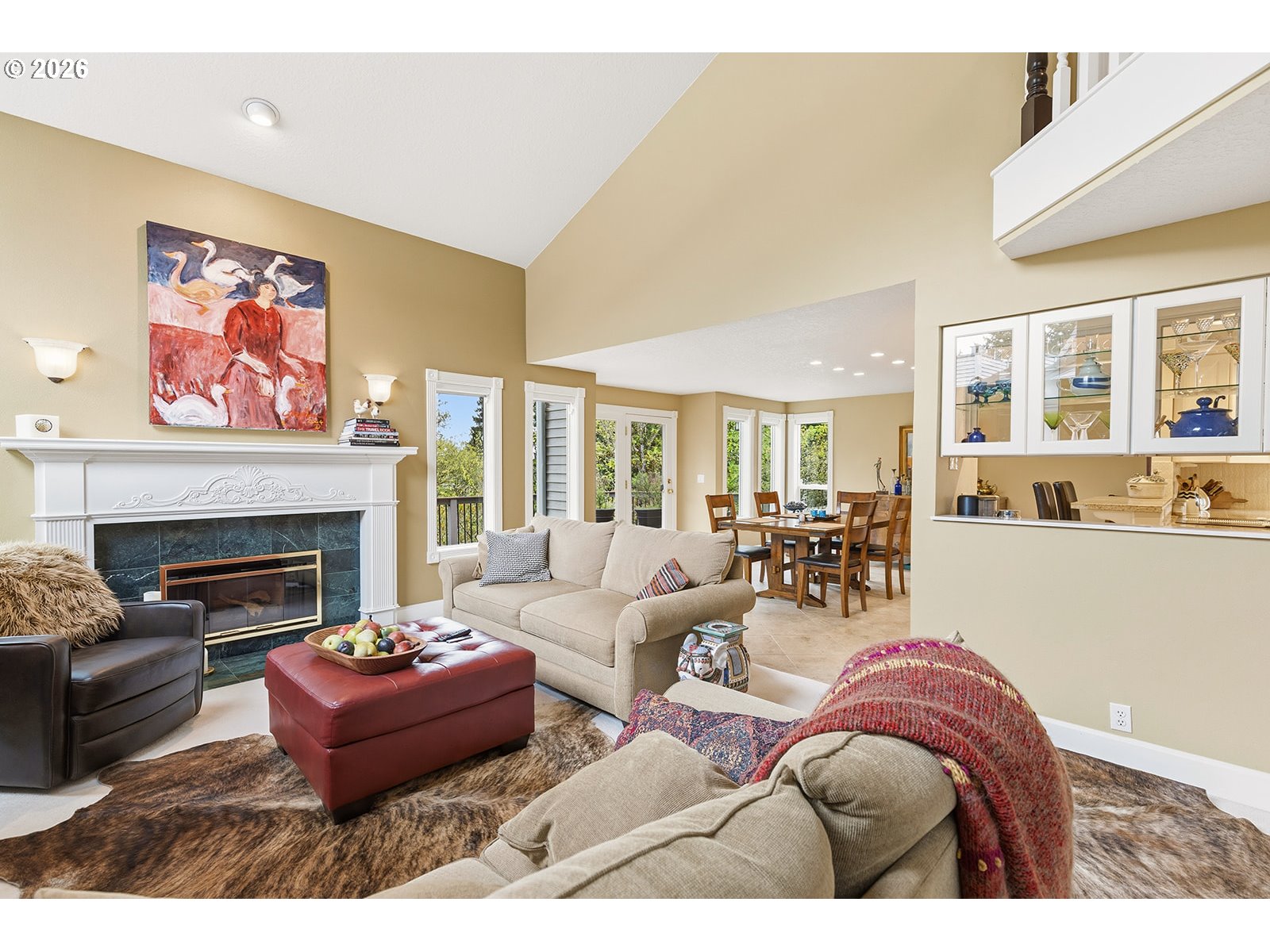 15917 Northeast Union Road, Unit 16 Ridgefield, WA 98642 - Photo 21 of 47 a living room with furniture a fireplace and a large window