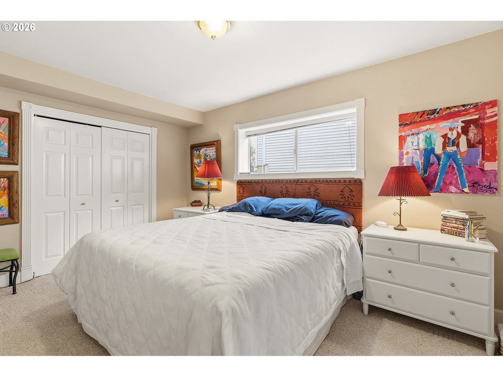 15917 Northeast Union Road, Unit 16 Ridgefield, WA 98642 - Photo 36 of 47 a bedroom with a bed and a window