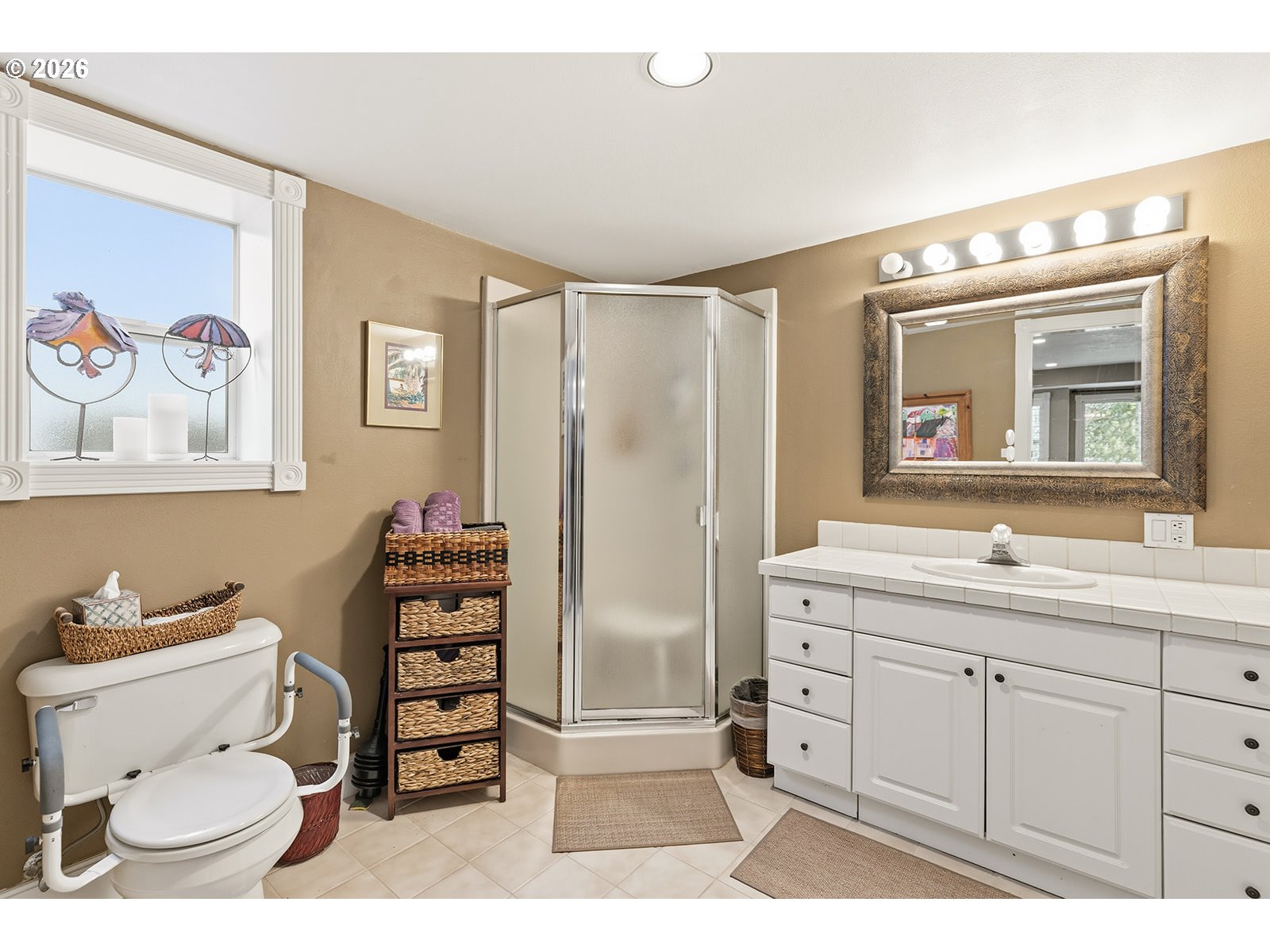 15917 Northeast Union Road, Unit 16 Ridgefield, WA 98642 - Photo 37 of 47 a bathroom with a toilet sink and mirror