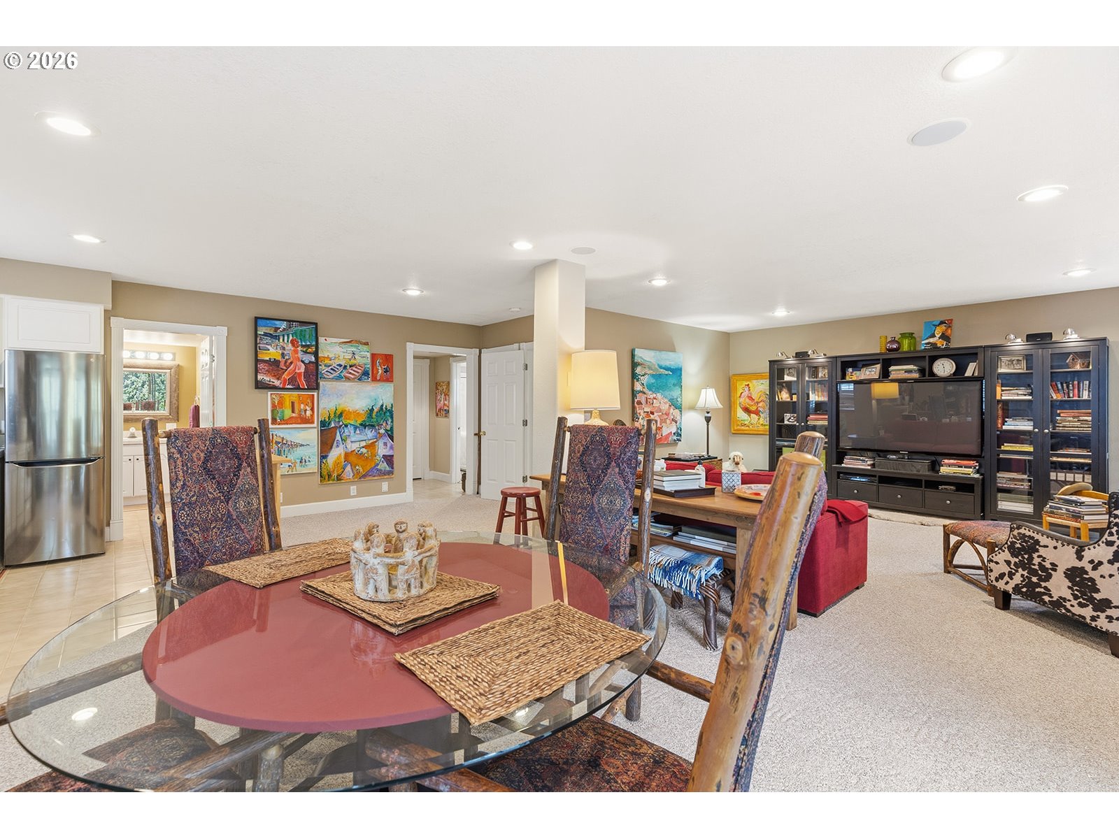 15917 Northeast Union Road, Unit 16 Ridgefield, WA 98642 - Photo 42 of 47 a living room with furniture a rug and kitchen view