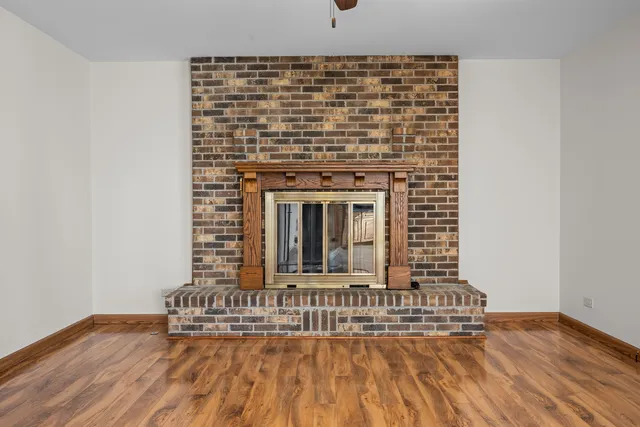 a view of a house with wooden floor and a sink