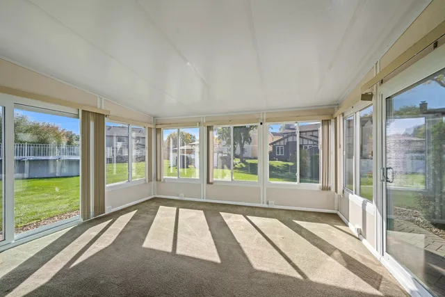 a bathroom with a large tub and shower