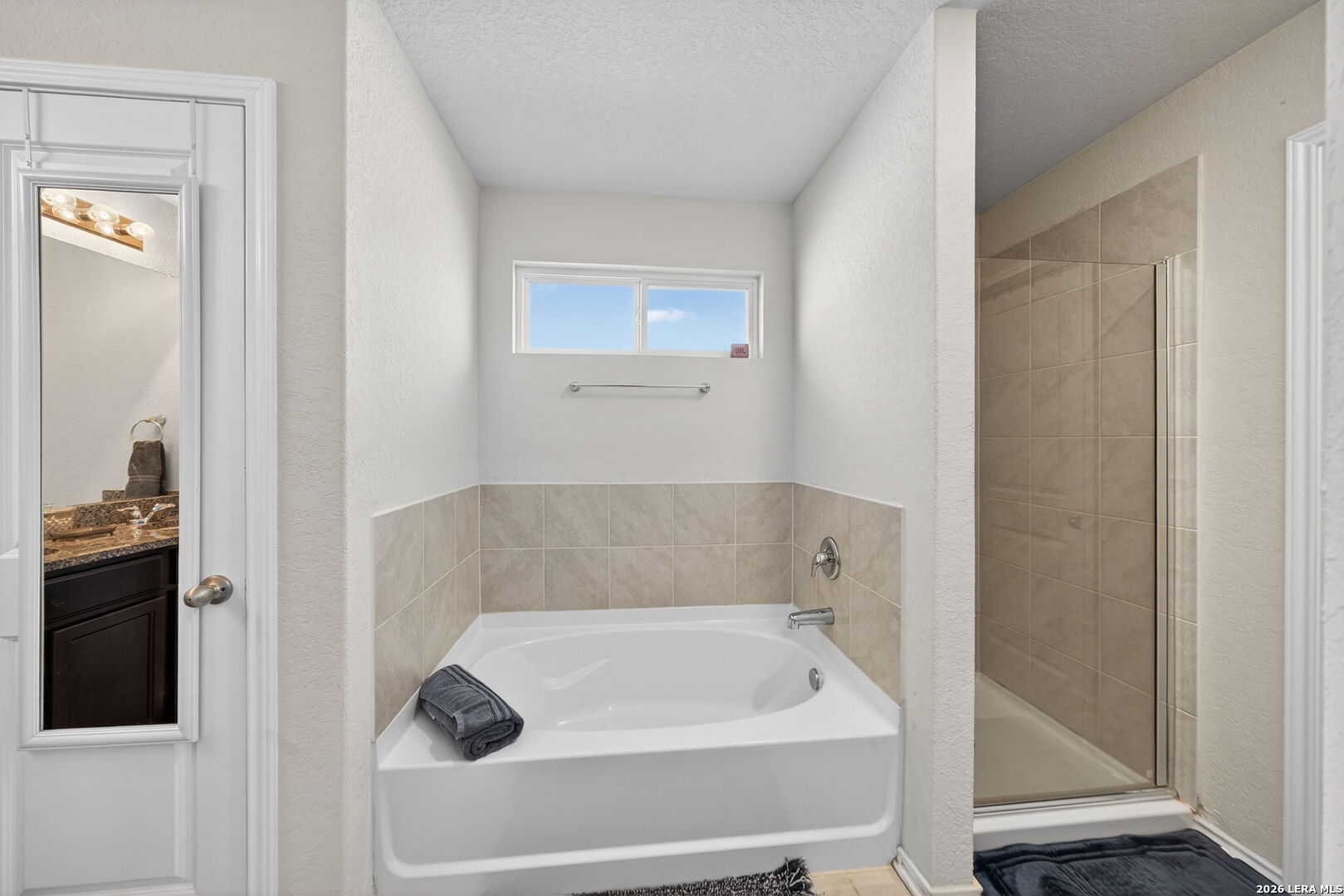 3653 Copper River Bulverde, TX 78163 - Photo 13 of 25 a bathroom with a tub and shower