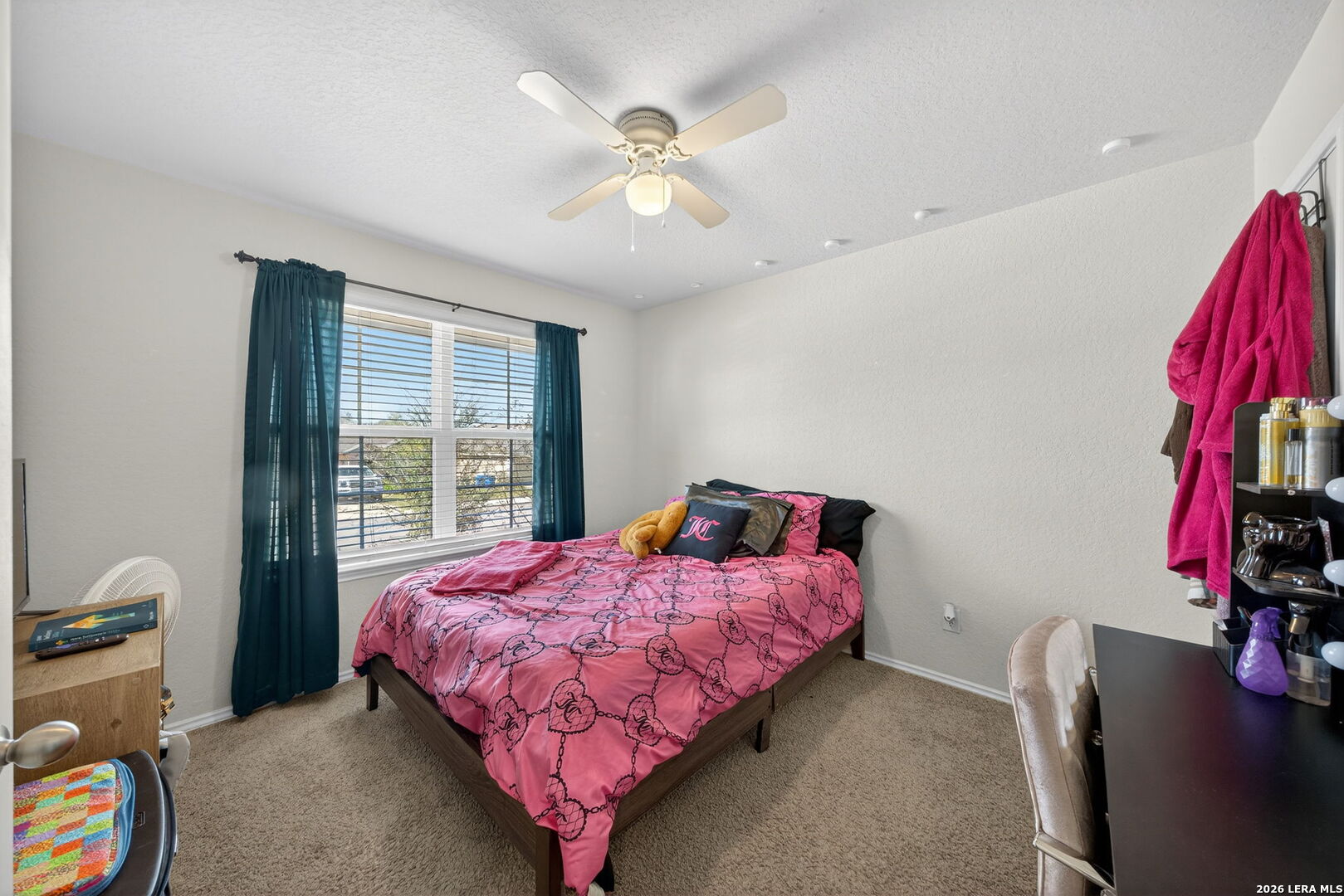 3653 Copper River Bulverde, TX 78163 - Photo 16 of 25 a bedroom with a bed and a window
