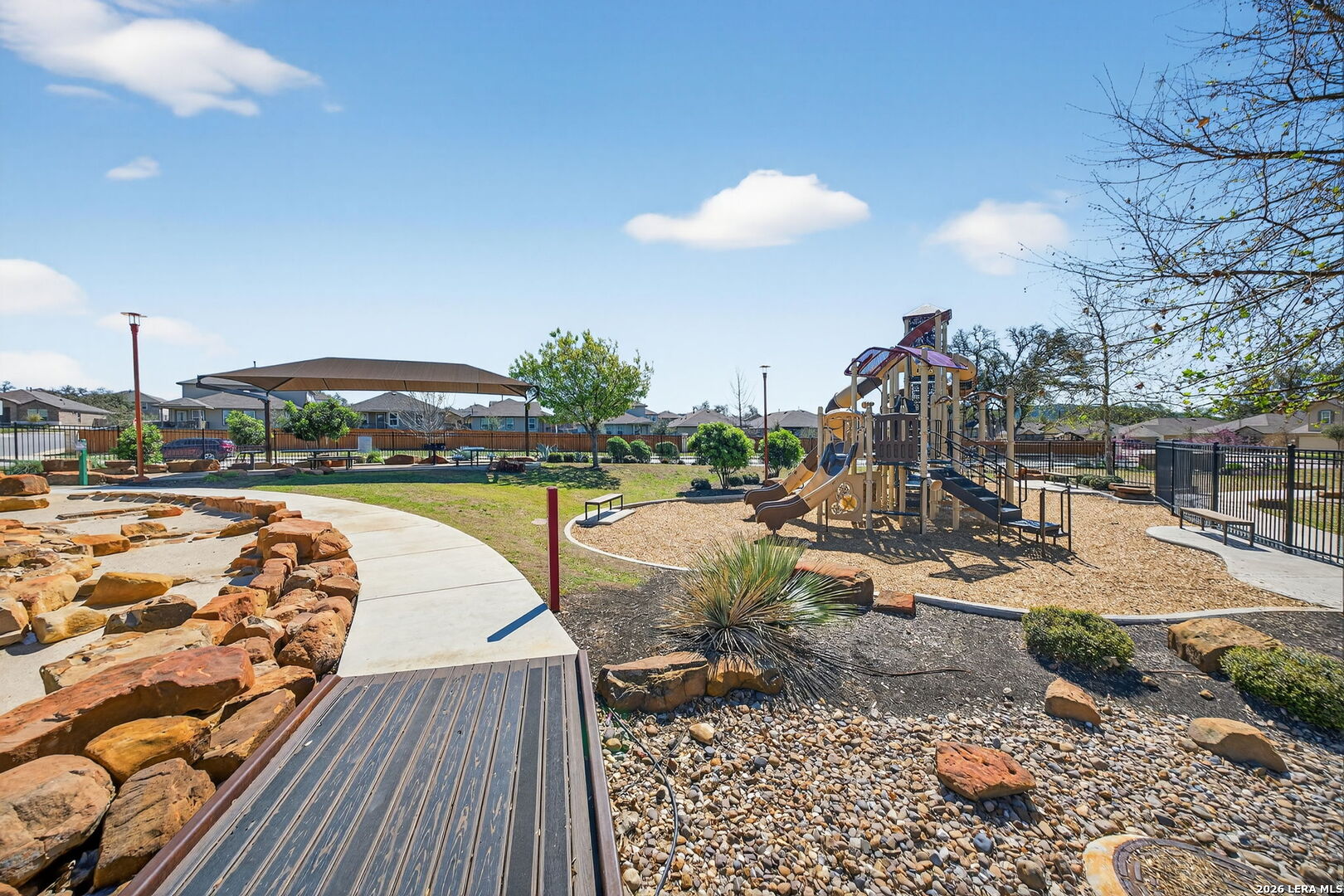 3653 Copper River Bulverde, TX 78163 - Photo 24 of 25 a view of a swimming pool with a patio and a yard