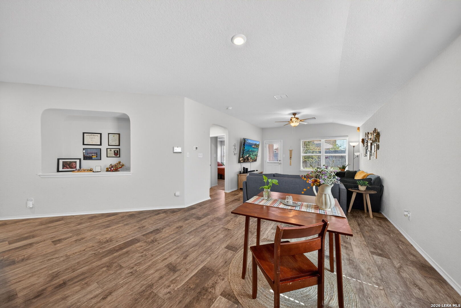 3653 Copper River Bulverde, TX 78163 - Photo 9 of 25 a view of a dining room with furniture and wooden floor