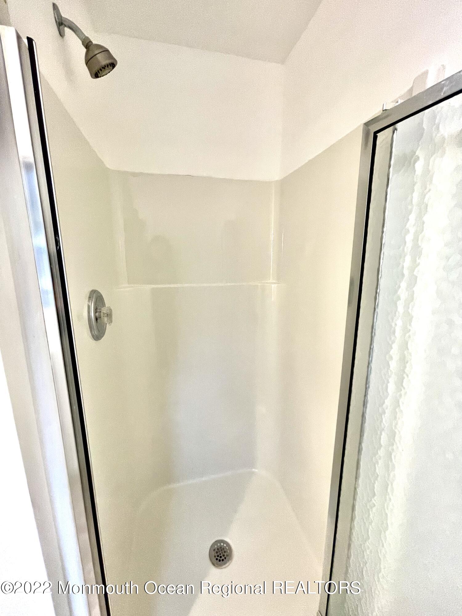 641 Thoroughfare Road Brick, NJ 08724 - Photo 34 of 48 a bathroom with a shower