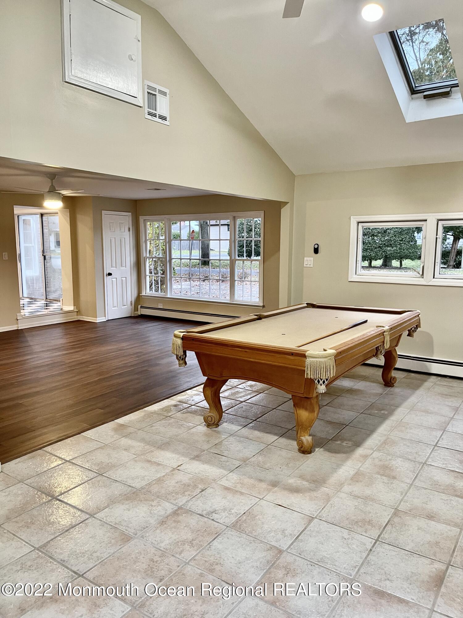 641 Thoroughfare Road Brick, NJ 08724 - Photo 38 of 48 a room with pool table and windows