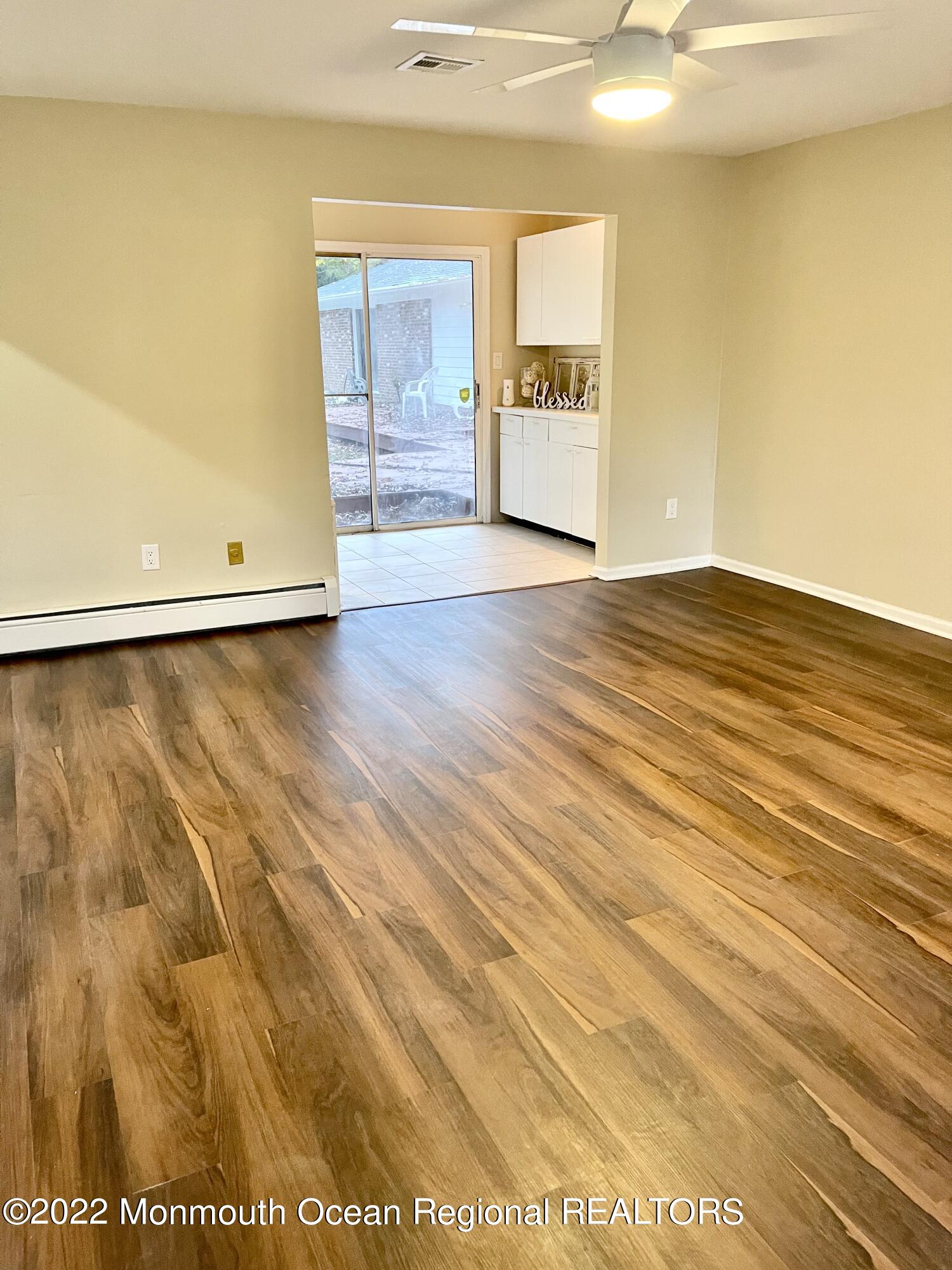 641 Thoroughfare Road Brick, NJ 08724 - Photo 39 of 48 a view of a room with a wooden floor