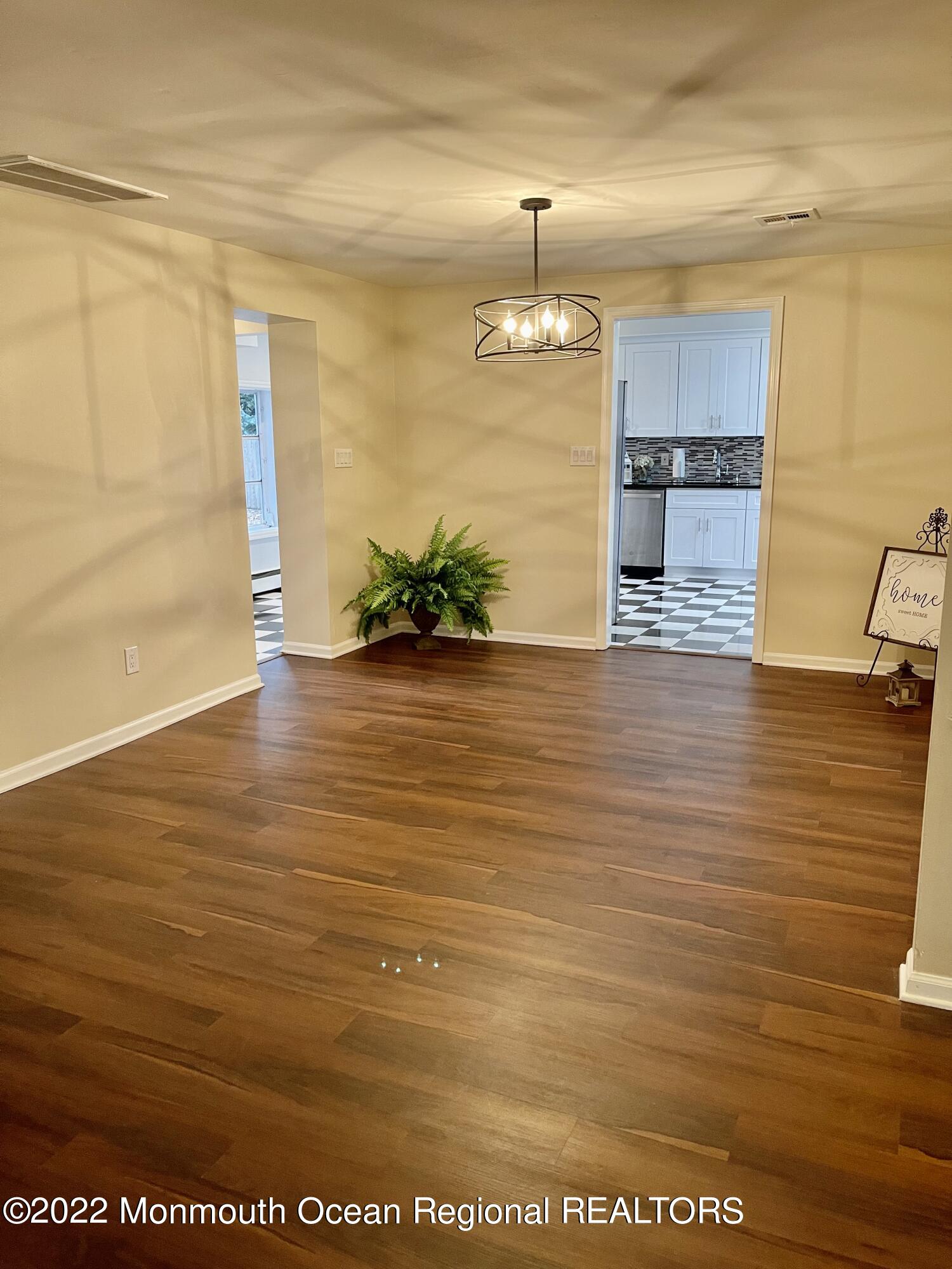 641 Thoroughfare Road Brick, NJ 08724 - Photo 7 of 48 a view of a room with wooden floor