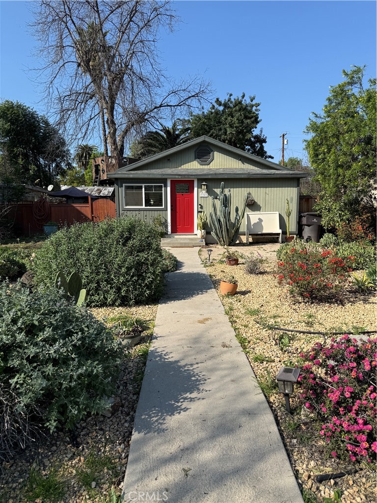3359 Locust Street Riverside, CA 92501 - Photo 1 of 23 a front view of house with yard