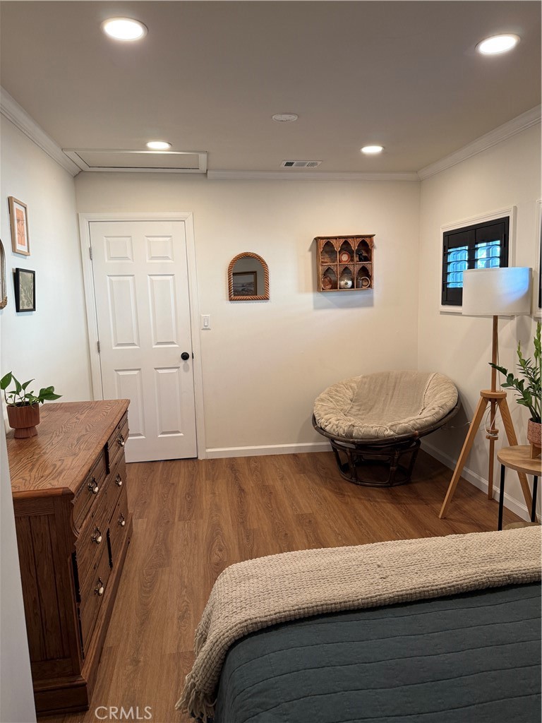 3359 Locust Street Riverside, CA 92501 - Photo 11 of 23 a bedroom with a bed and a table