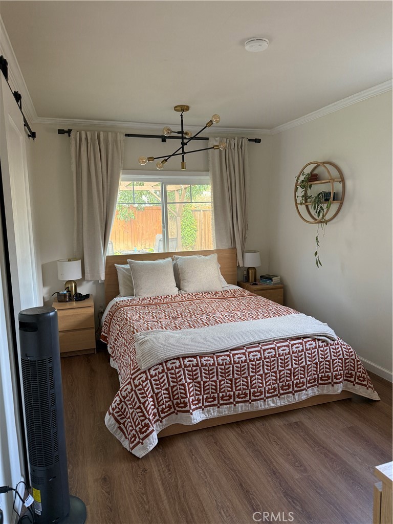 3359 Locust Street Riverside, CA 92501 - Photo 12 of 23 a bedroom with a bed and a window